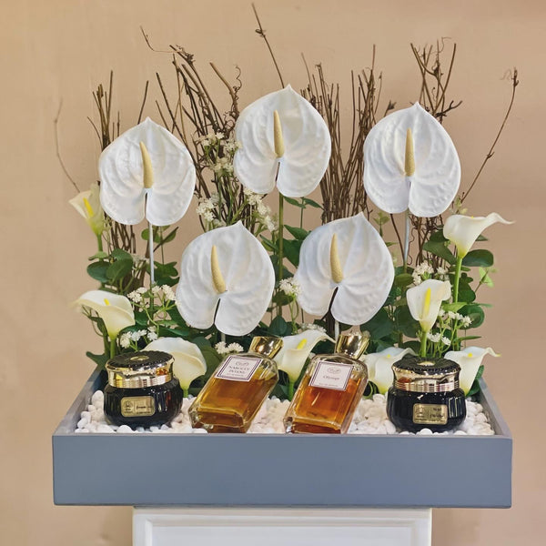 Anthurium and perfumes arrangement