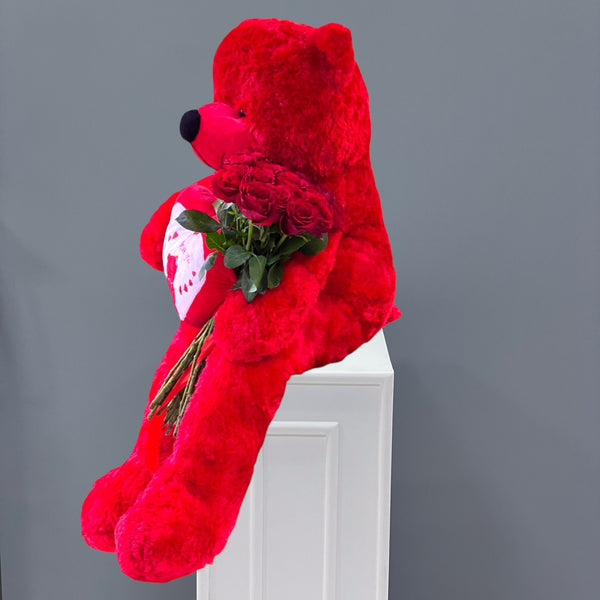 Teddy bear with 20 red roses