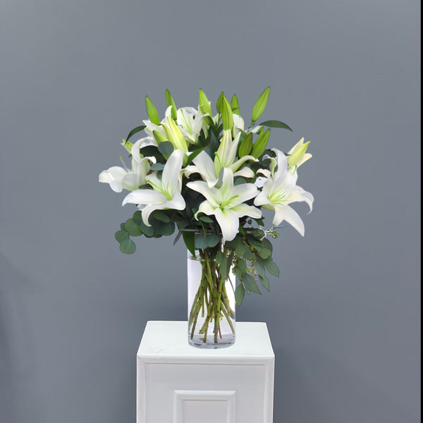 White Lily Flower Arrangement in Vase